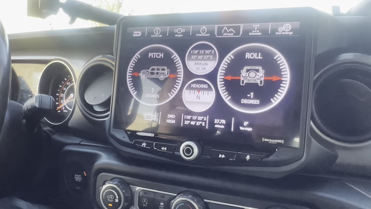 Audio MotorSports install of a Stinger HEIGH10 in a Jeep Wrangler, screen on.